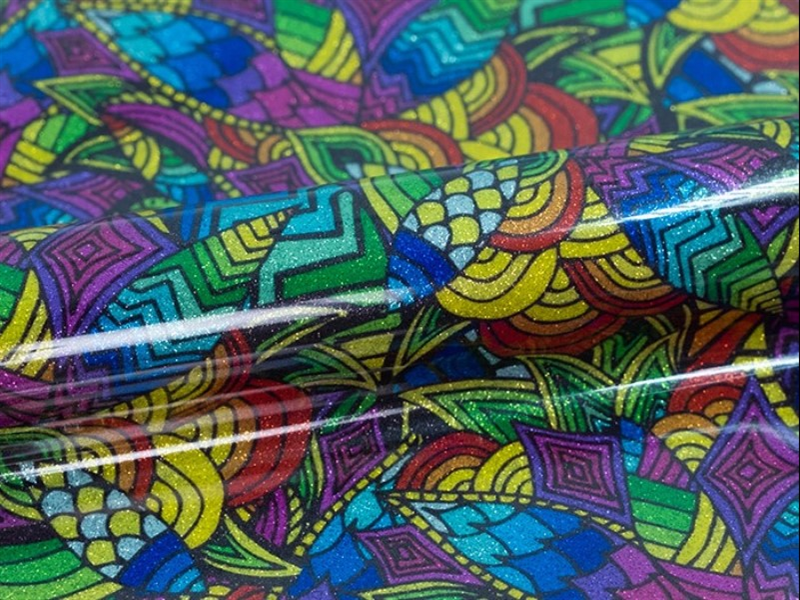 5 mt of EASYPATTERNS PLUS GLITTER FINISH TROPICAL RAINBOW. Heat transfer roll SISER